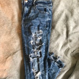 Distressed ripped jeans